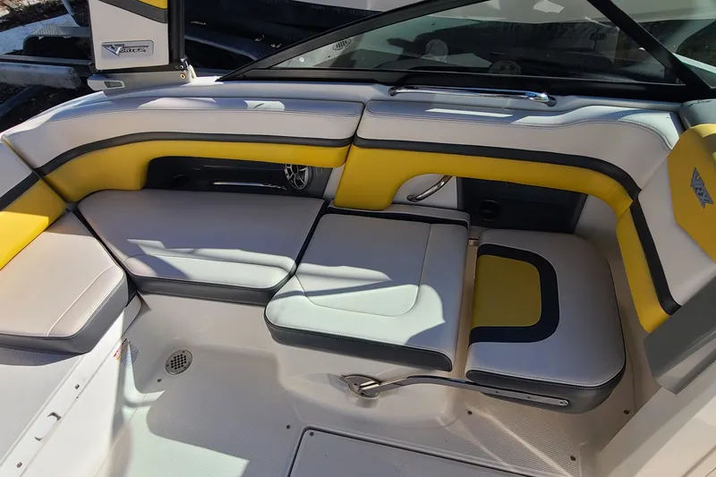 Slide: The Image of 2017 Chaparral Vortex 203 VRX boat interior with yellow and gray seating. - 12