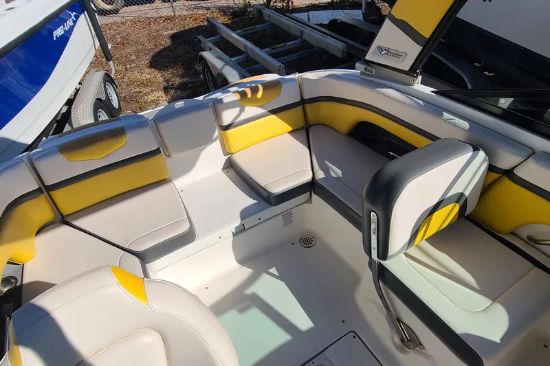 Slide: The Image of 2017 Chaparral Vortex 203 VRX boat interior with yellow and gray seating. - 15