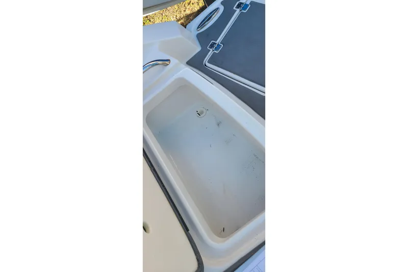 Slide: The Image of 2017 Chaparral Vortex 203 VRX boat interior storage compartment. - 26