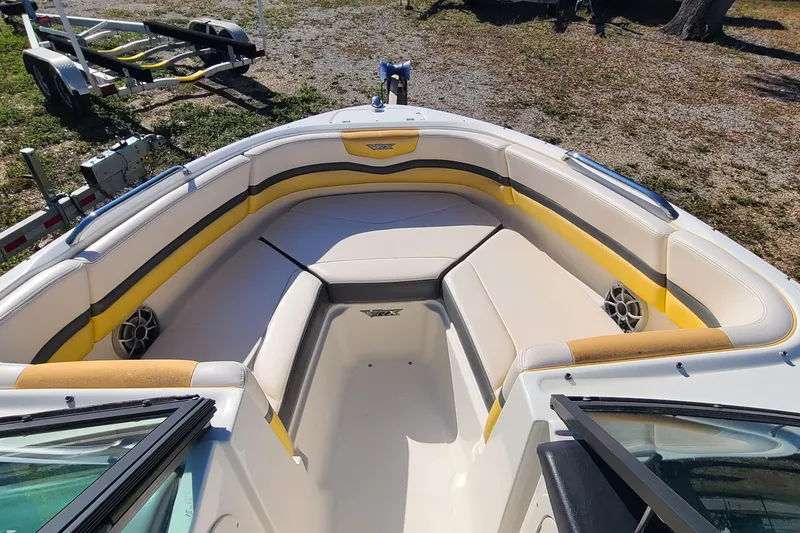 Slide: The Image of 2017 Chaparral Vortex 203 VRX boat interior with yellow and white seating. - 5