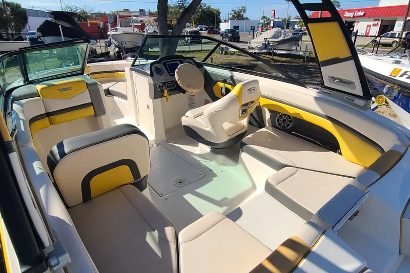 Slide: The Image of 2017 Chaparral Vortex 203 VRX boat interior with yellow and white seating. - 6