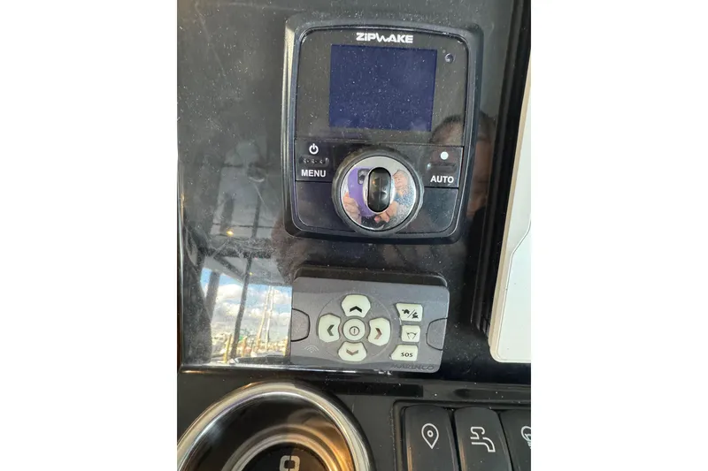 Slide: The Image of Control panel of 2025 Beneteau Antares 11 Fly with Zipwake system. - 20