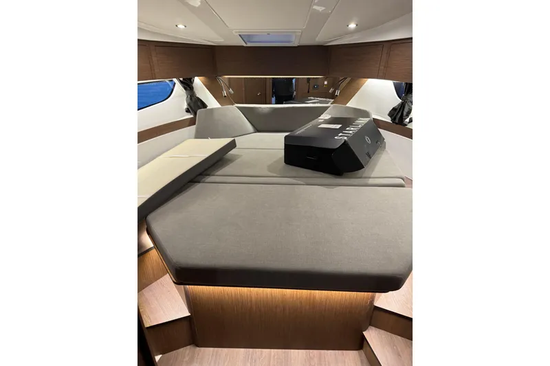 Slide: The Image of Interior cabin of 2025 Beneteau Antares 11 Fly, featuring modern design and comfortable seating. - 30