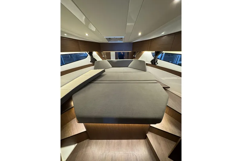 Slide: The Image of Luxurious interior of 2025 Beneteau Antares 11 Fly with modern design and cozy seating. - 40