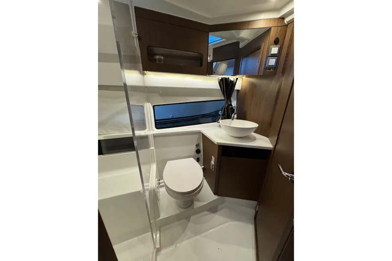 Slide: The Image of Luxurious bathroom in 2025 Beneteau Antares 11 Fly yacht with modern fixtures. - 42