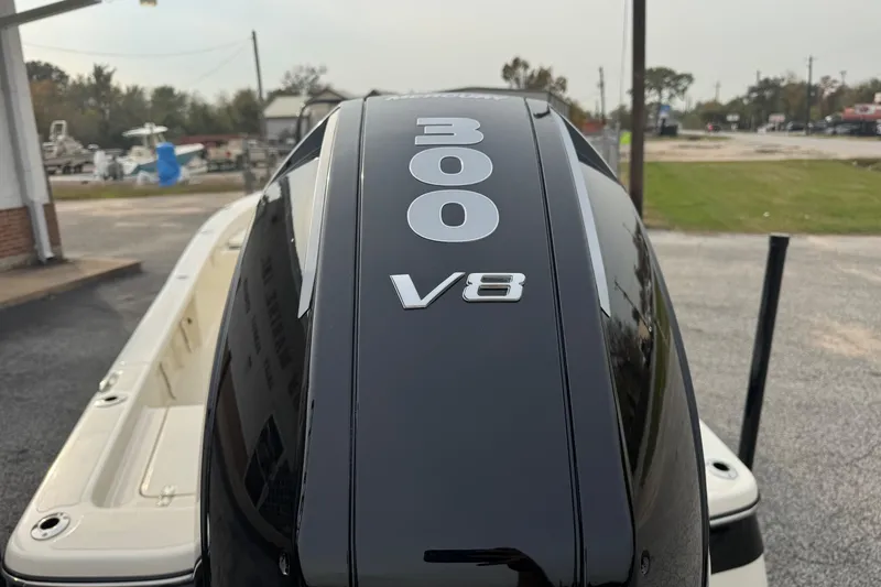 Slide: The Image of Outboard motor with "300 V8" label on a 2026 BlackJack 224 boat. - 6
