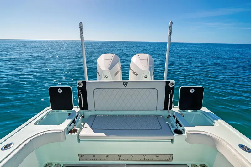 Slide: The Image of 2023 Barker Boatworks 26 Open on calm ocean, featuring dual Mercury engines. - 38