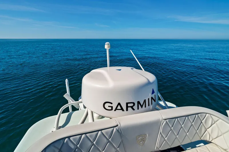 Slide: The Image of 2023 Barker Boatworks 26 Open with Garmin equipment on open sea. - 27