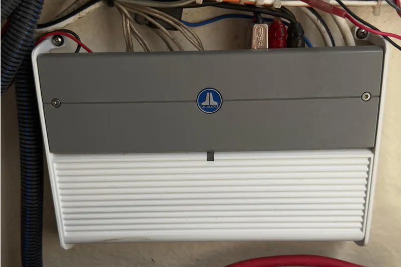 Slide: The Image of JL Audio amplifier in 2023 Key West 219 FS boat, showcasing wiring and installation. - 11