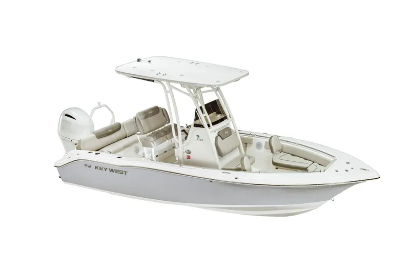 Slide: The Image of 2023 Key West 219 FS boat interior with cushioned seating and cup holders. - 20