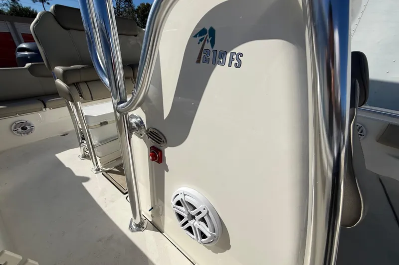 Slide: The Image of 2023 Key West 219 FS boat interior with seating and stainless steel railings. - 25