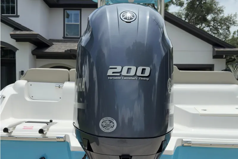 Slide: The Image of 2023 Key West 219 FS boat with Yamaha 200 engine, featuring variable camshaft timing. - 3
