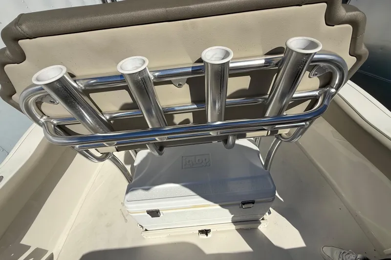 Slide: The Image of 2023 Key West 219 FS boat with rod holders and cooler storage. - 32