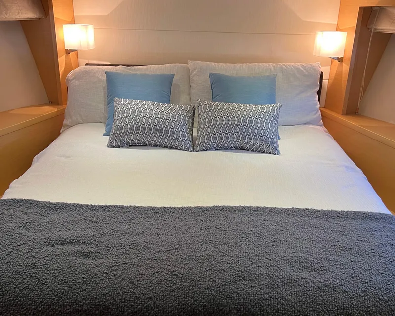 Slide: The Image of Luxurious bedroom interior of 2013 Prestige 500 S yacht with elegant bedding and soft lighting. - 15