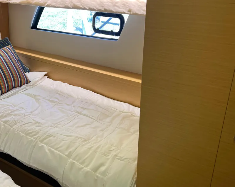 Slide: The Image of Cozy cabin bed with striped pillow in 2013 Prestige 500 S yacht. - 18