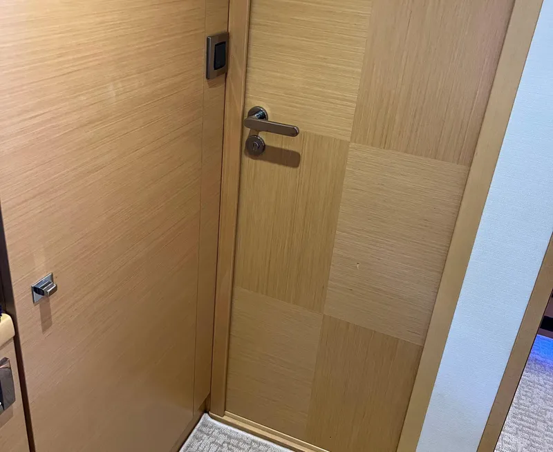 Slide: The Image of Wooden interior door with modern handle on a 2013 Prestige 500 S yacht. - 23