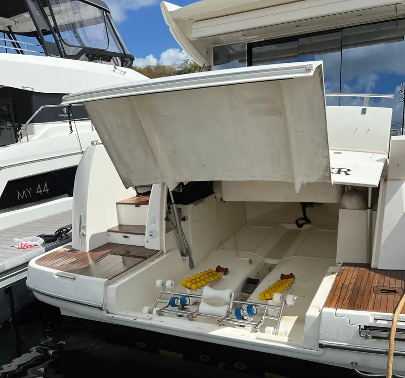 Slide: The Image of 2013 Prestige 500 S yacht with open storage compartment at the stern. - 33