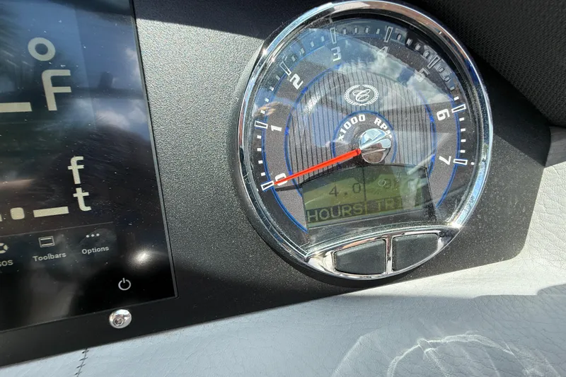 Slide: The Image of 2024 Cobalt 220S dashboard with RPM gauge and digital display. - 12