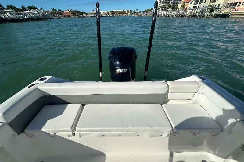 Slide: The Image of 2018 Tidewater 232 LXF boat with Yamaha 250 engine on calm water. - 17