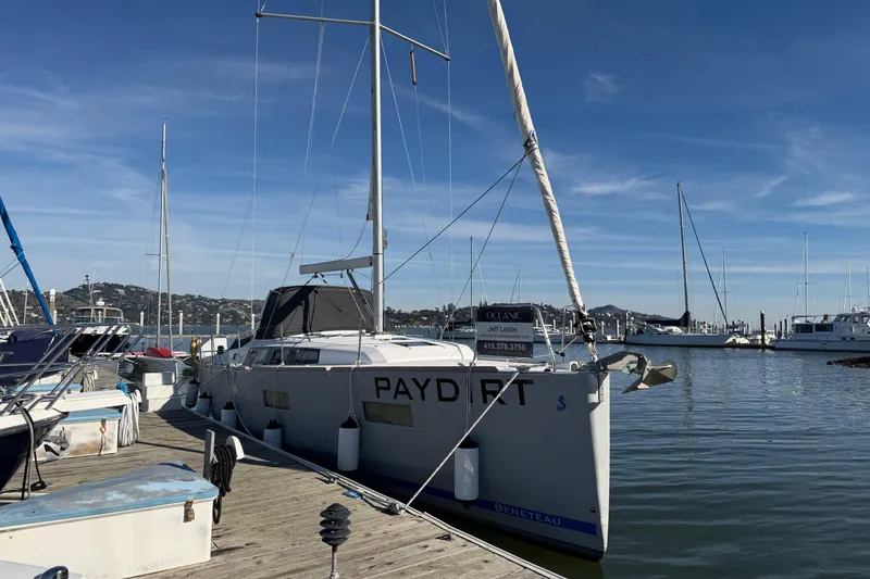 Slide: The Image of Sailboat docked at marina, 2014 Beneteau 38, clear sky, calm water. - 0