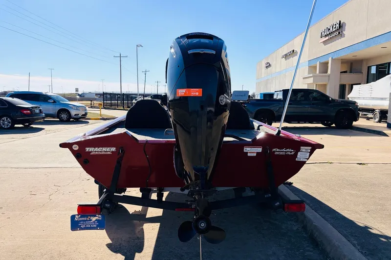 Slide: The Image of 2024 Tracker Pro Team 175 TXW boat on trailer, parked outside dealership. - 6