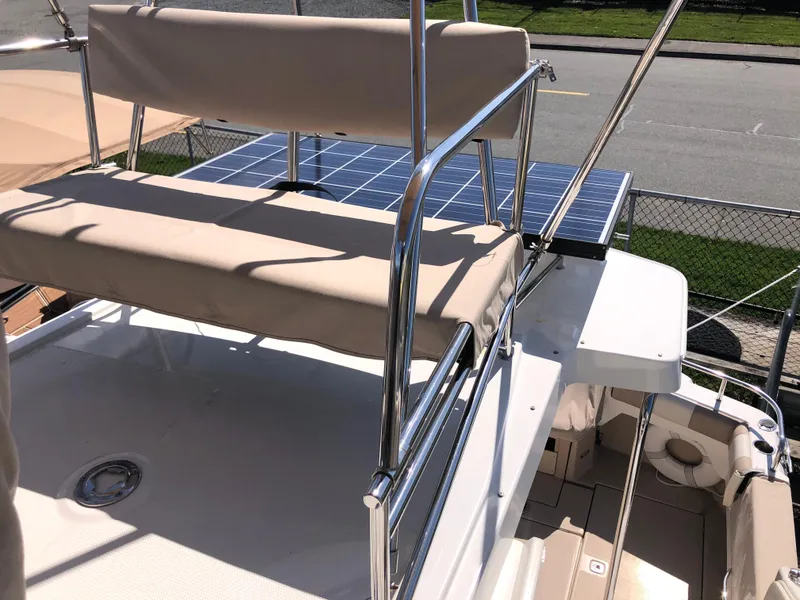 Slide: The Image of 2016 Cutwater 30 Command Bridge with solar panels and seating on the deck. - 14