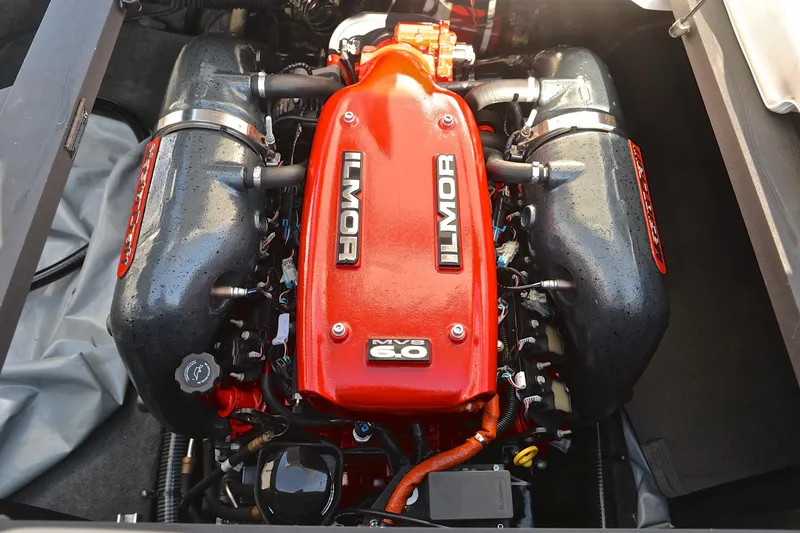 Slide: The Image of 2013 MasterCraft X-35 engine, Ilmor MV8 6.0, red and black components. - 28