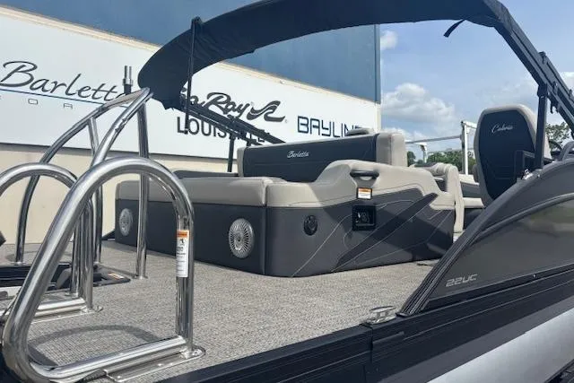 Slide: The Image of 2026 Barletta C22UC pontoon boat with sleek design and comfortable seating. - 1