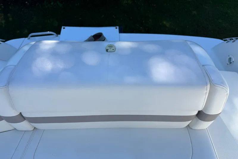 Slide: The Image of White cushioned seat on 2001 Formula 260 Sun Sport boat deck. - 11