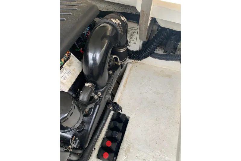 Slide: The Image of Engine compartment of a 2001 Formula 260 Sun Sport boat, showing components and wiring. - 28