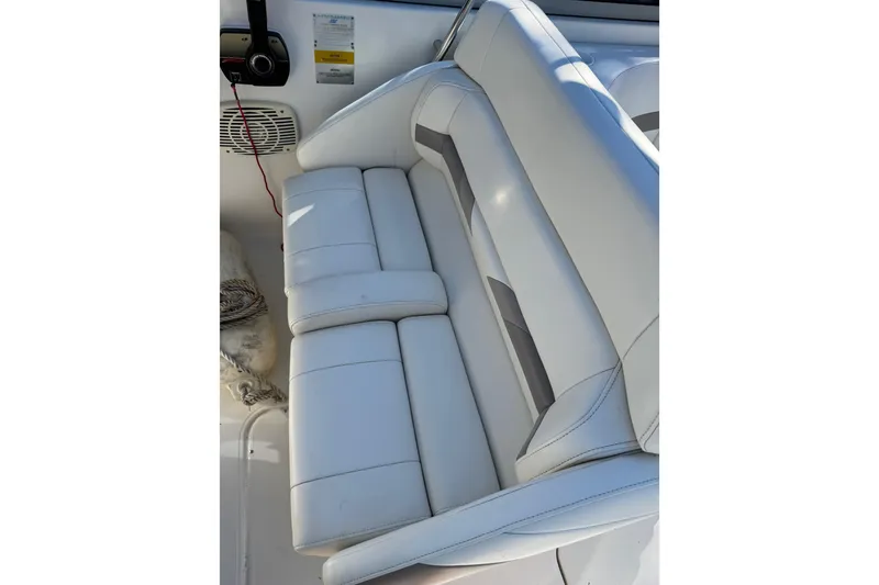 Slide: The Image of White leather seating on a 2001 Formula 260 Sun Sport boat. - 9