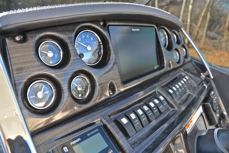 Slide: The Image of Dashboard of 2018 Monterey 275 Sport Yacht with gauges and controls. - 31