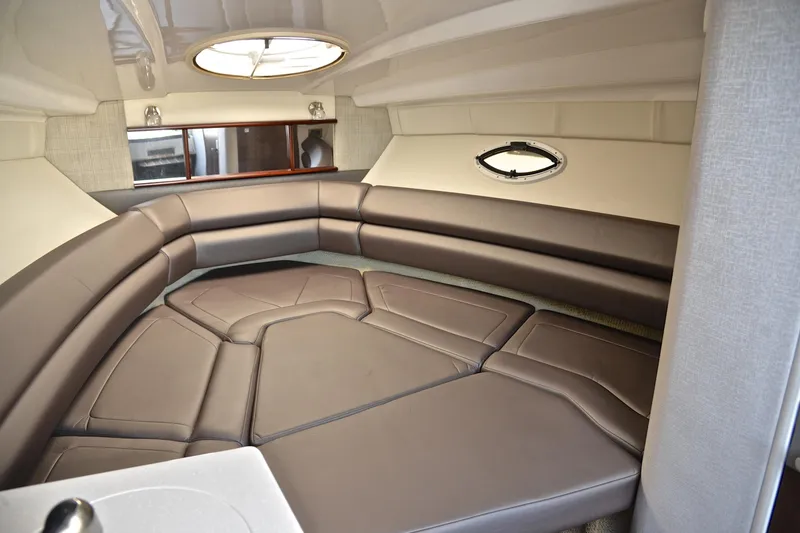 Slide: The Image of 2018 Monterey 275 Sport Yacht interior with plush seating and modern design. - 34