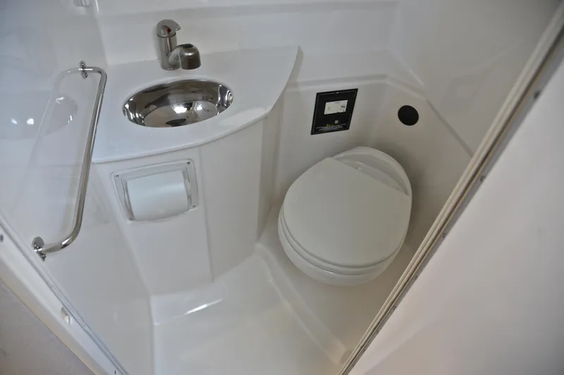 Slide: The Image of 2018 Monterey 275 Sport Yacht bathroom with sink and toilet. - 37