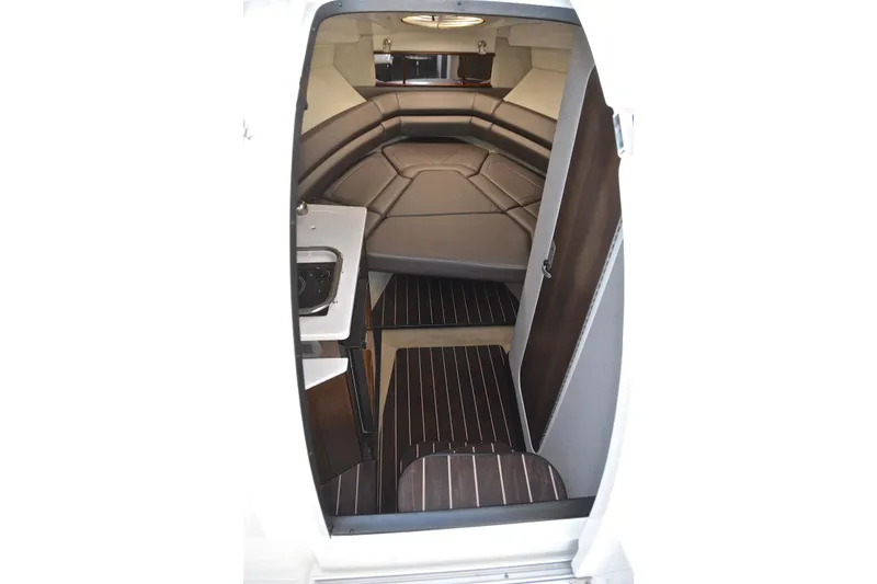 Slide: The Image of Interior of 2018 Monterey 275 Sport Yacht, featuring cozy seating and modern amenities. - 42