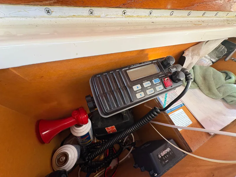 Slide: The Image of VHF radio and accessories in 1988 Carver 36 Aft Cabin boat interior. - 13