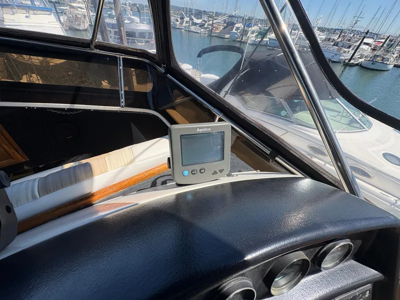 Slide: The Image of Interior view of 1988 Carver 36 Aft Cabin yacht with navigation equipment. - 15