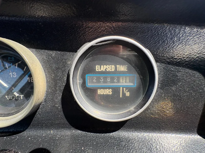 Slide: The Image of Elapsed time gauge showing 2382.1 hours on 1988 Carver 36 Aft Cabin. - 16