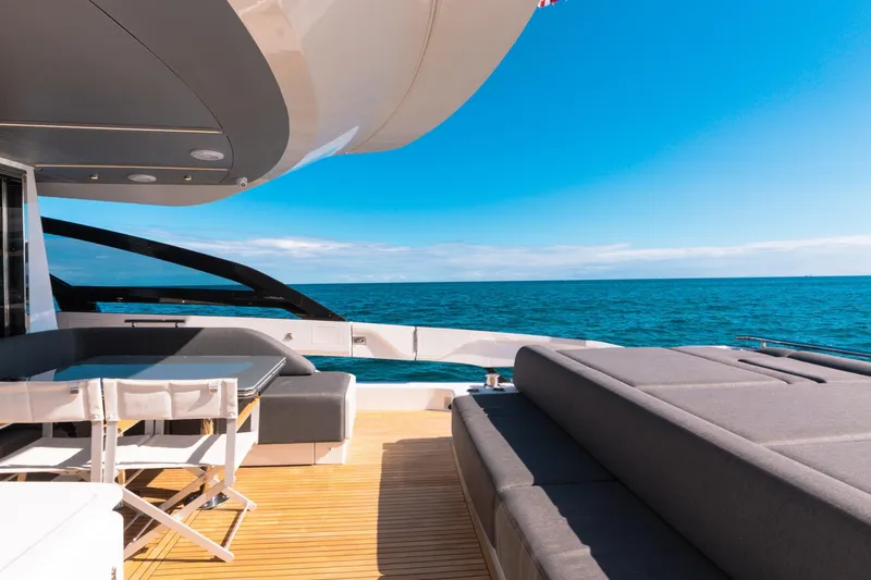 Slide: The Image of Luxurious 2023 Azimut S8 yacht deck with ocean view and modern seating. - 16