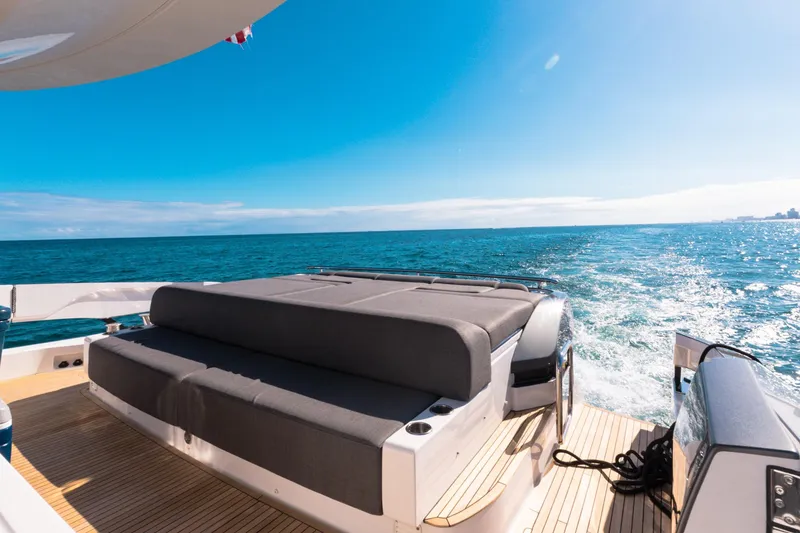 Slide: The Image of 2023 Azimut S8 yacht deck with ocean view and luxurious seating. - 22