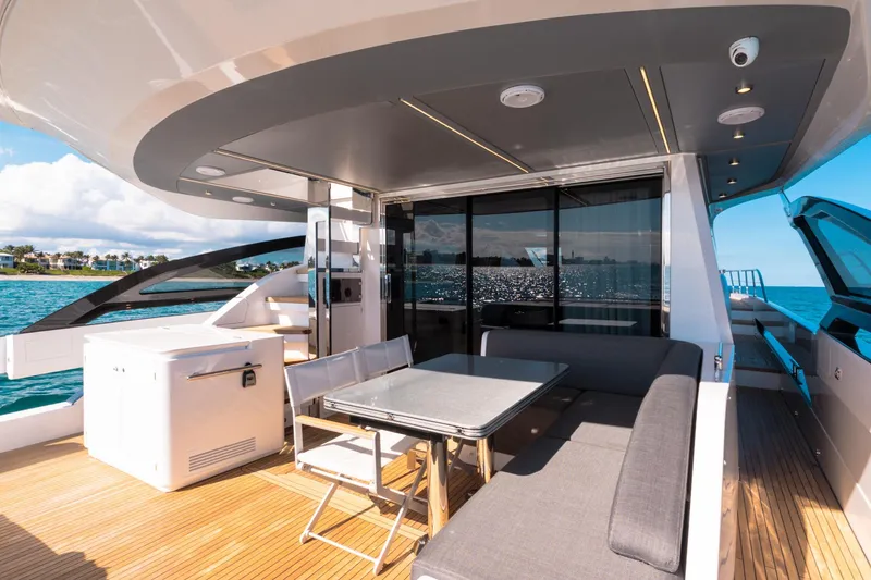 Slide: The Image of Luxurious 2023 Azimut S8 yacht deck with modern seating and ocean view. - 23