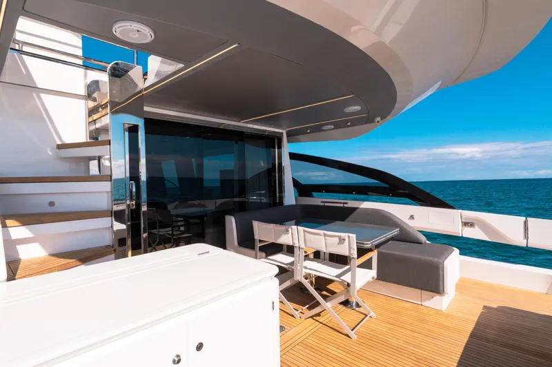 Slide: The Image of Luxurious 2023 Azimut S8 yacht deck with modern seating and ocean view. - 24