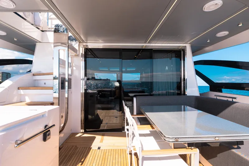 Slide: The Image of Luxurious 2023 Azimut S8 yacht deck with modern seating and ocean view. - 25