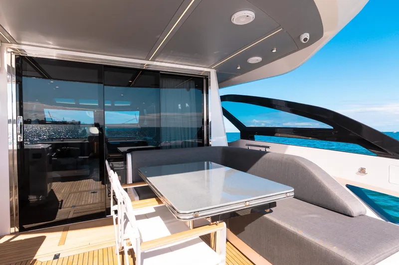 Slide: The Image of Luxurious 2023 Azimut S8 yacht deck with modern seating and ocean view. - 26