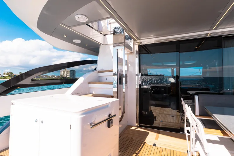 Slide: The Image of Luxury 2023 Azimut S8 yacht deck with ocean view and modern design. - 28