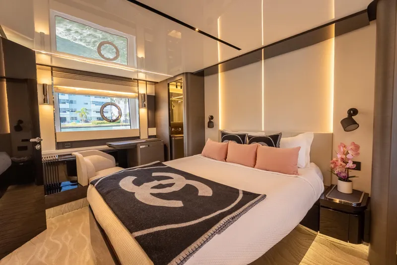 Slide: The Image of Luxurious bedroom interior of 2023 Azimut S8 yacht with modern decor and elegant lighting. - 43
