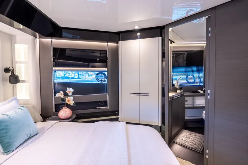 Slide: The Image of Luxurious 2023 Azimut S8 yacht interior with modern bedroom and ensuite bathroom. - 49