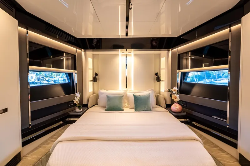 Slide: The Image of Luxurious 2023 Azimut S8 yacht bedroom with modern design and elegant lighting. - 50