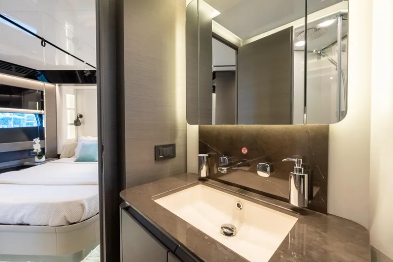 Slide: The Image of Luxurious bathroom interior of 2023 Azimut S8 yacht with modern fixtures and elegant design. - 52