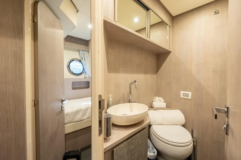 Slide: The Image of Luxurious bathroom interior of 2023 Azimut S8 yacht, featuring modern fixtures and elegant design. - 54
